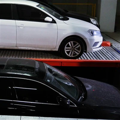 Sistem Parkir Puzzle Hemat-Ruang dengan Lubang